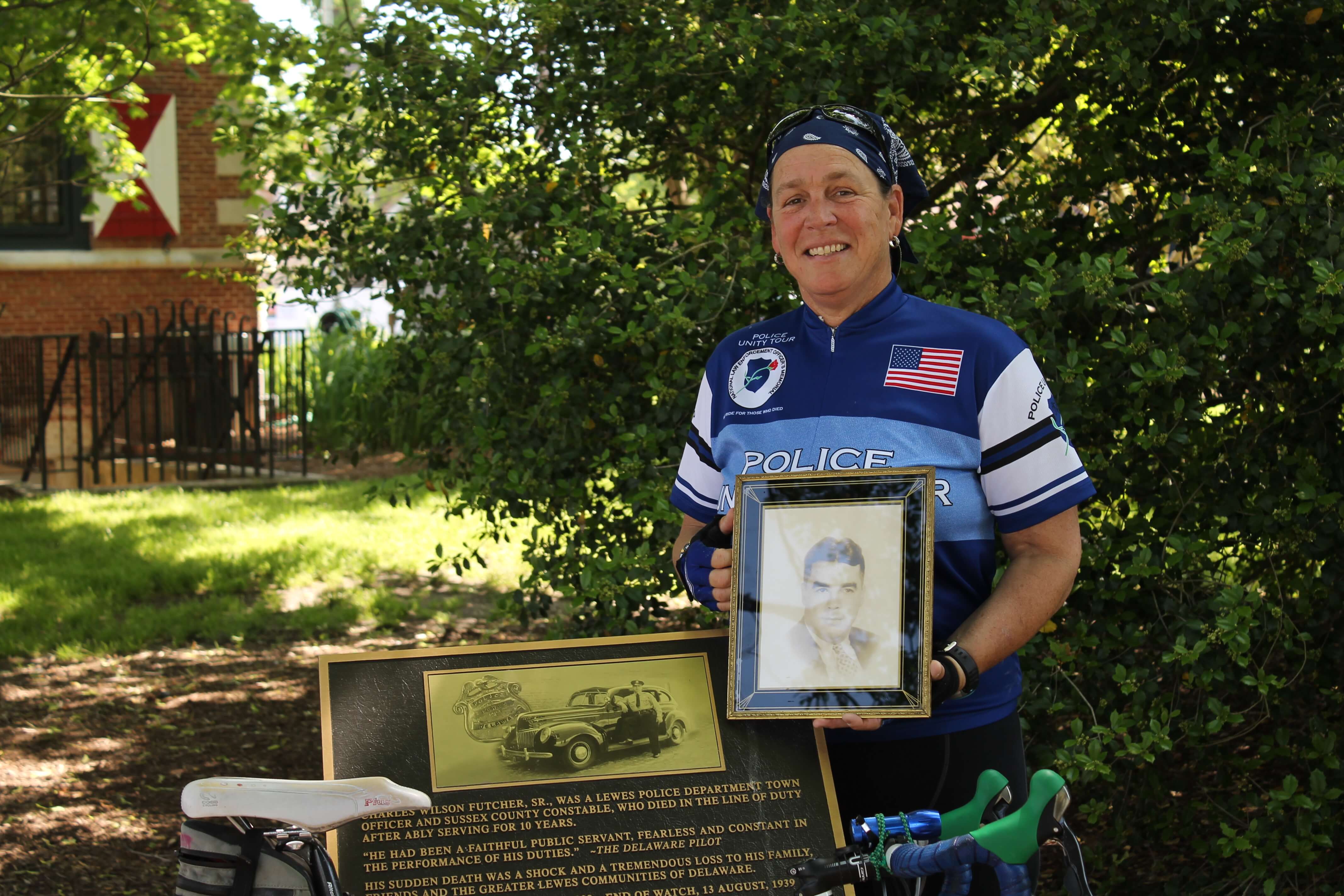 Futcher poses by memorial