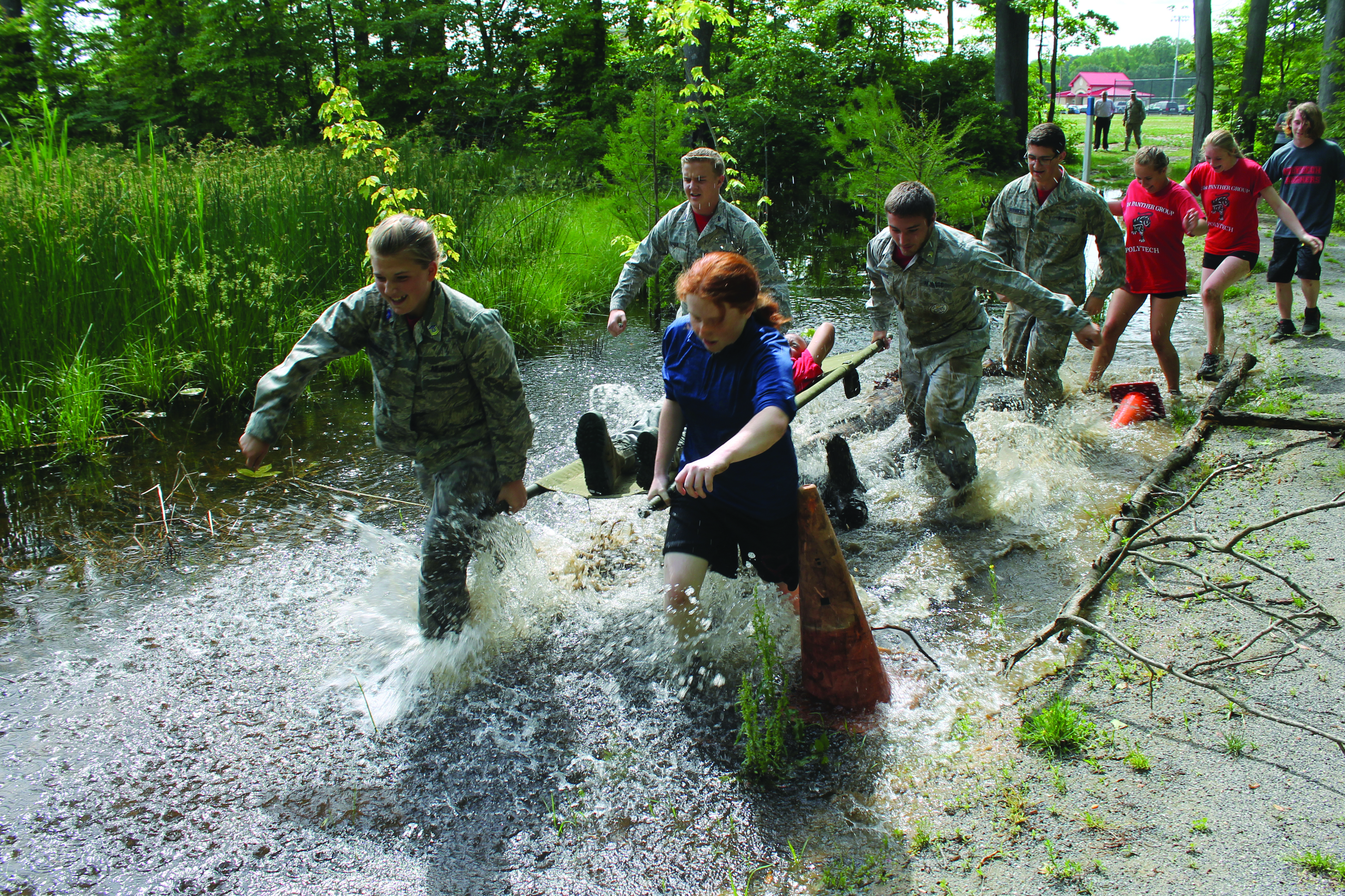 Students practice for the  “litter carry.”