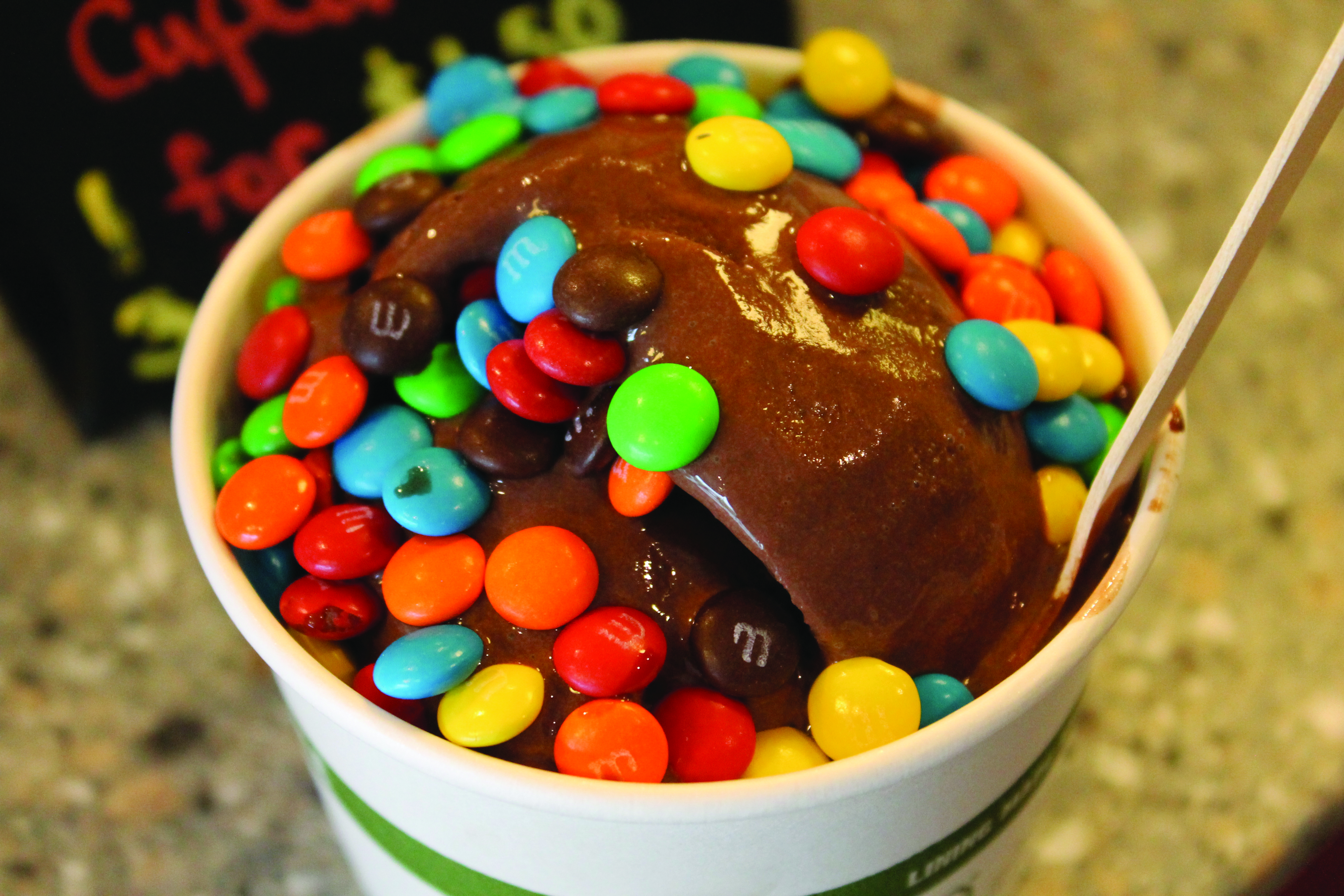 A decadent treat topped with chocolate candy.