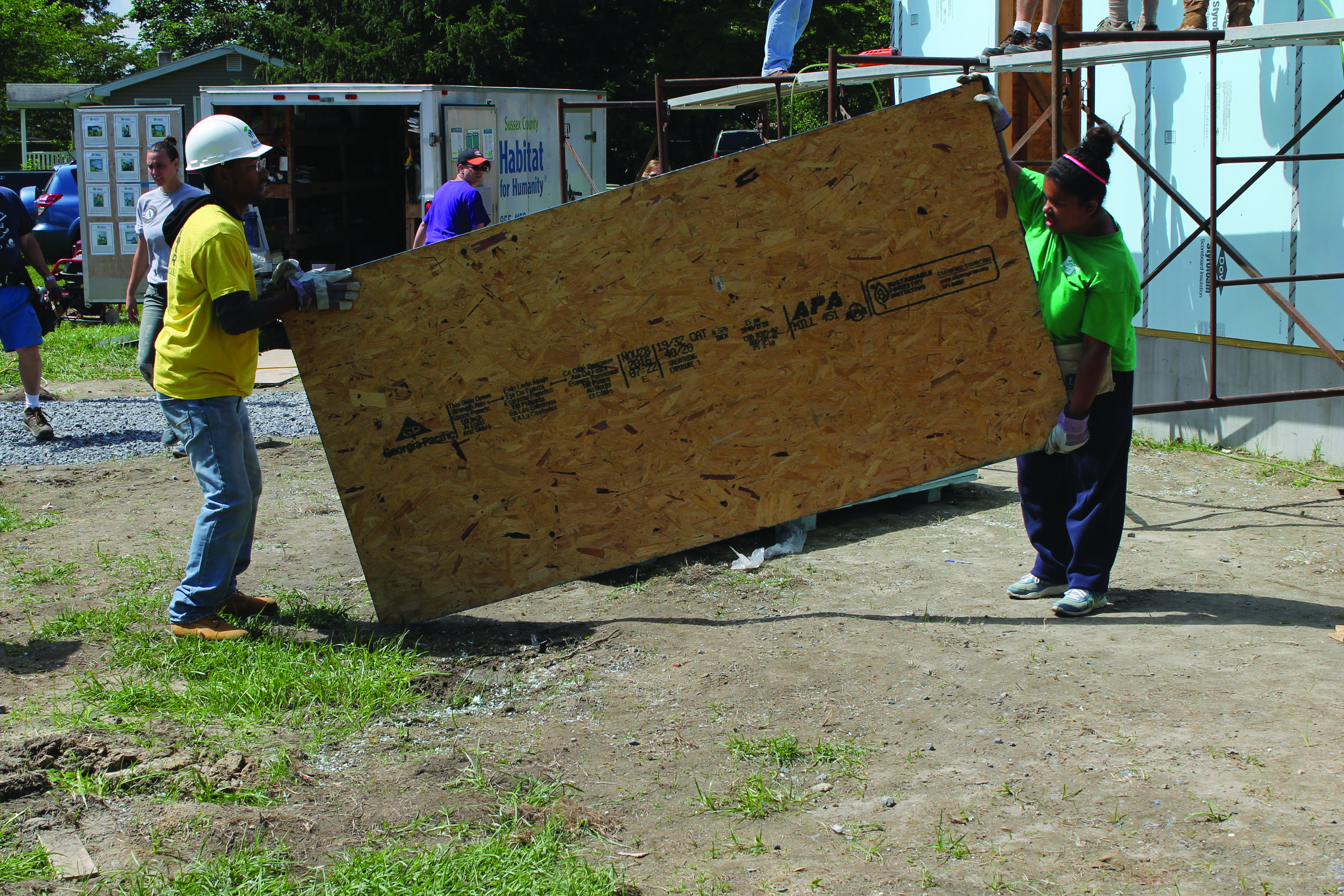 Steven Efford works to build his family’s new home.