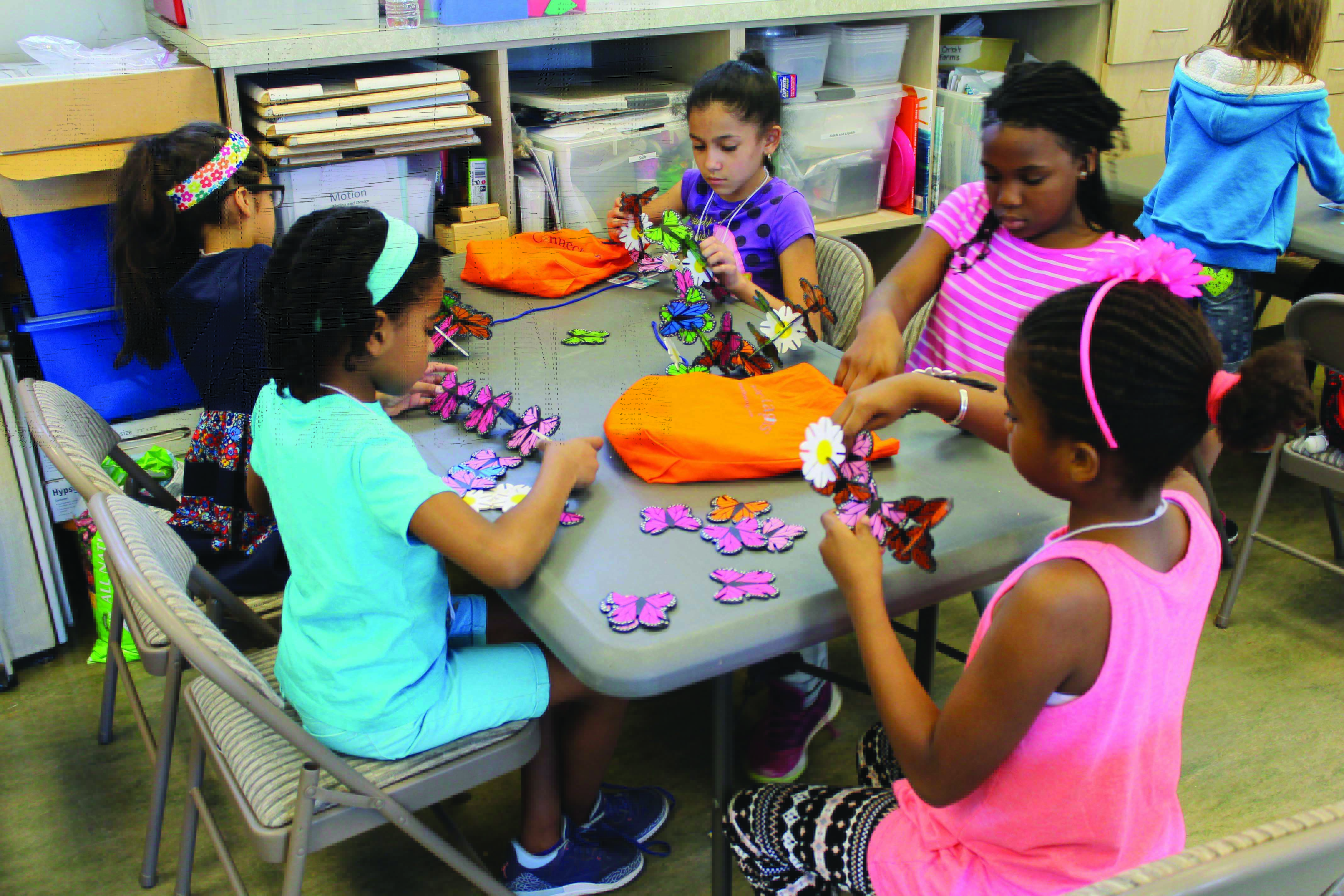 Students participate in hands-on learning during a trip to DASEF.