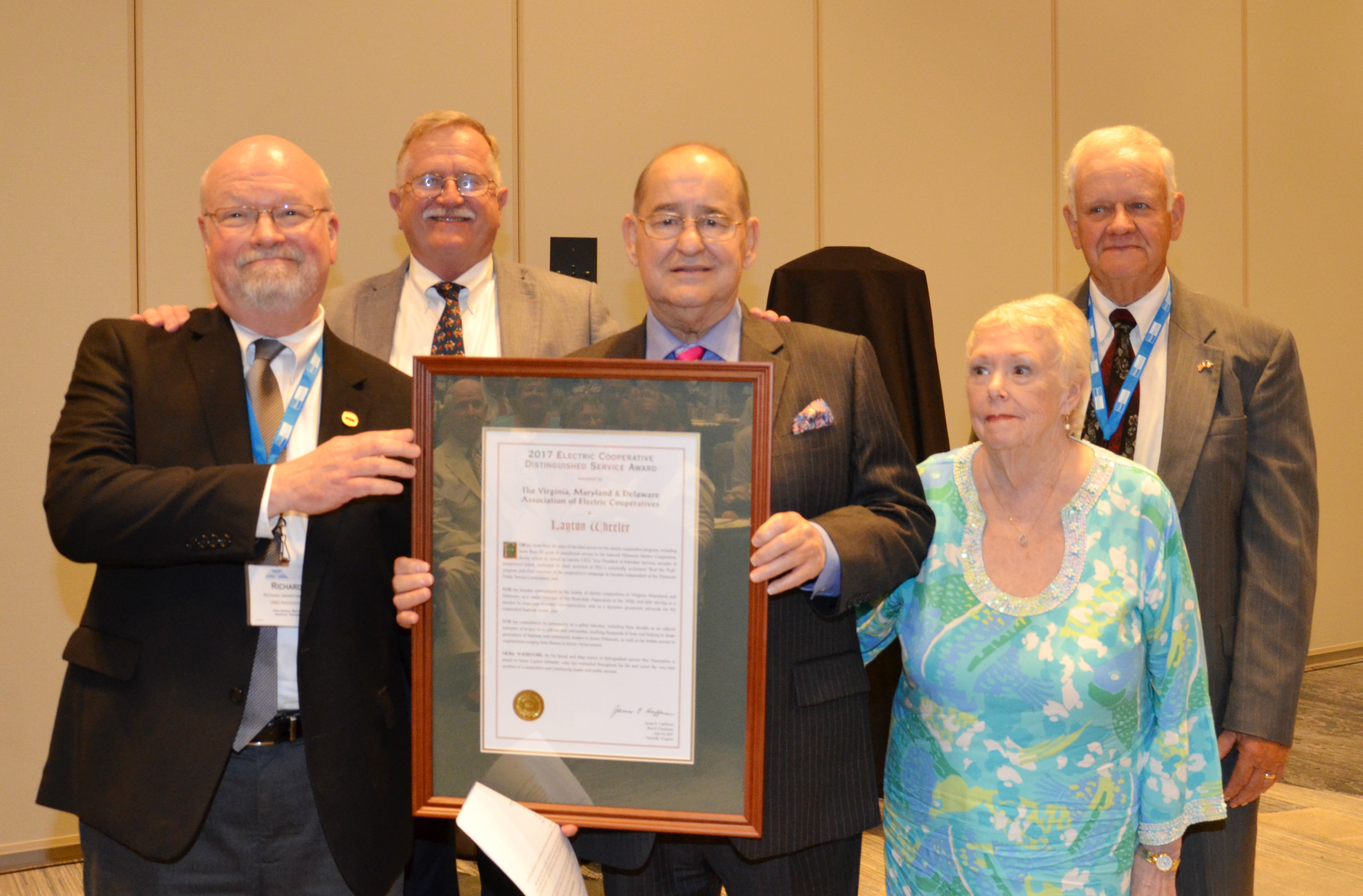Layton Wheeler, who served Delaware Electric Cooperative (DEC) for 35 years until his retirement in 2014, received the Electric Cooperatives’ Distinguished Service Award at VMDAEC’s July 24, 2017 Annual Meeting in Norfolk, Virginia. From left: VMDAEC President and CEO Richard Johnstone, DEC President and CEO Bill Andrew, Layton Wheeler, Layton’s wife Beverly, and VMDAEC Board Chairman James Huffman.