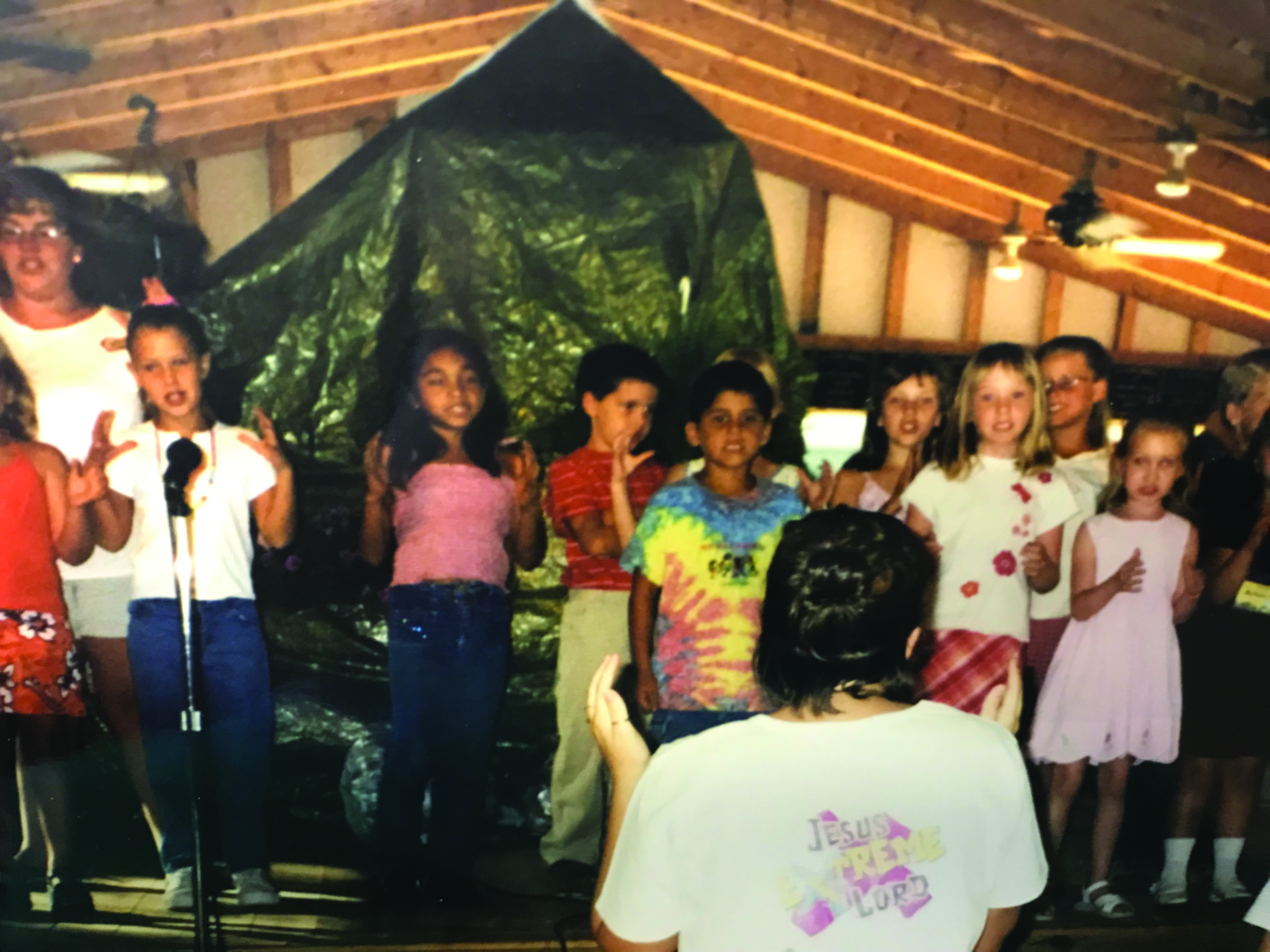 Children perform at the vacation Bible school closing program.