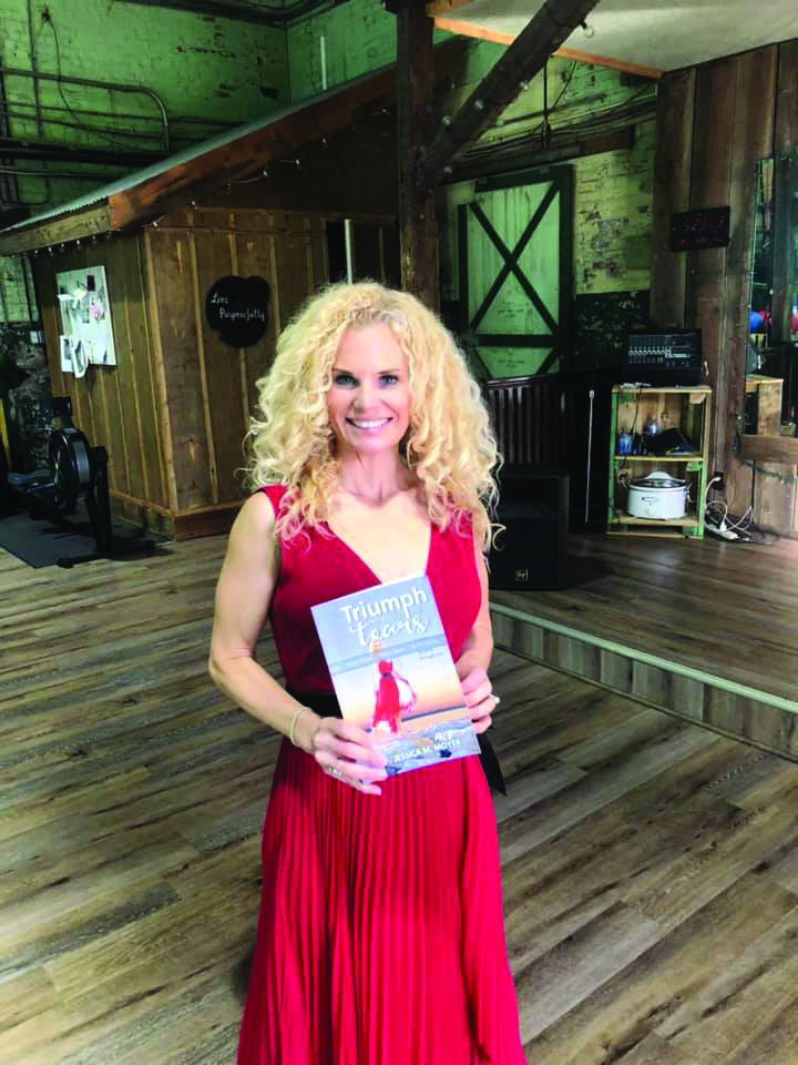 Jess Moyer with her book "Triumph Through the Tears."