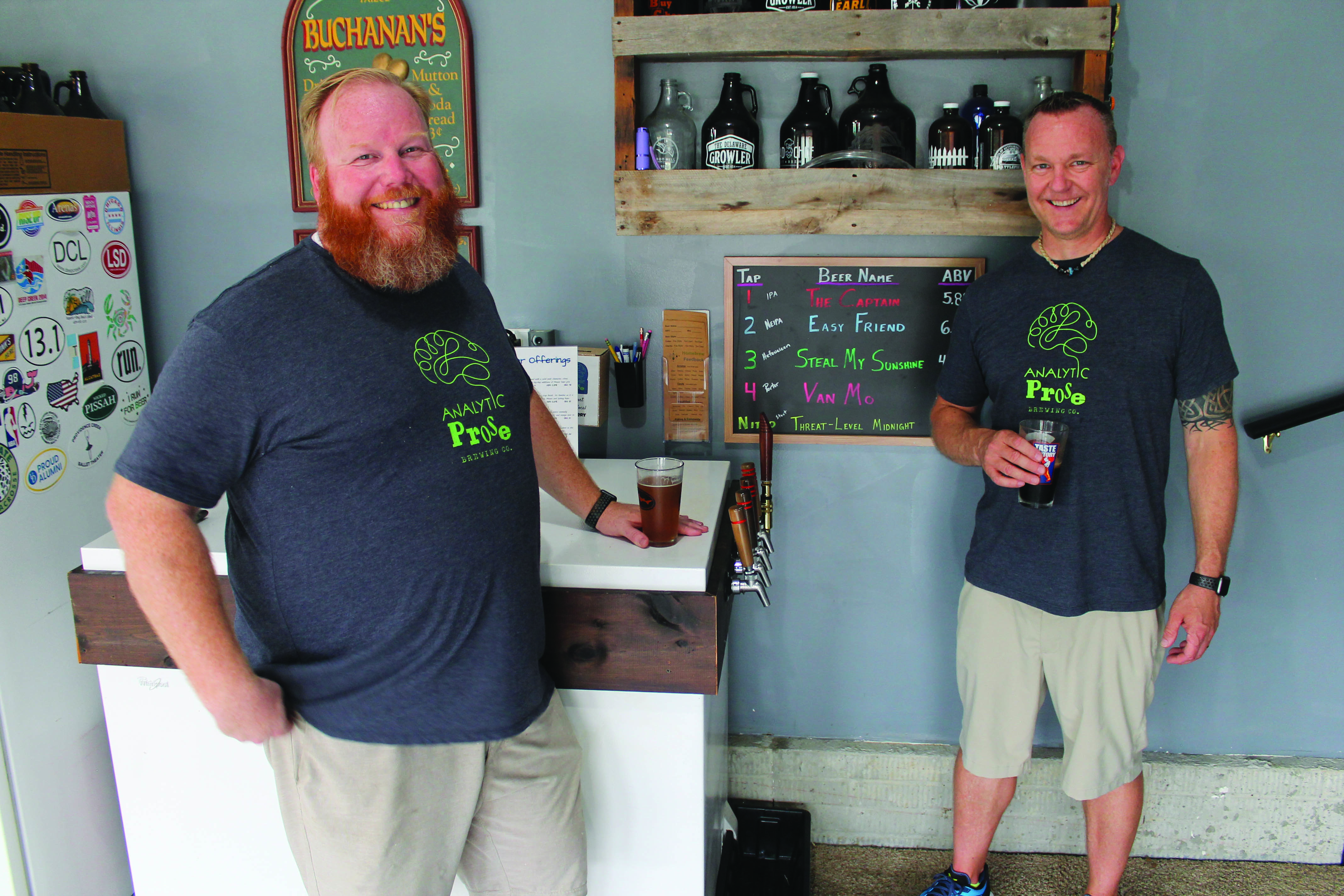 Dan Semenick and Ryan Buchanan in their home-brewery.