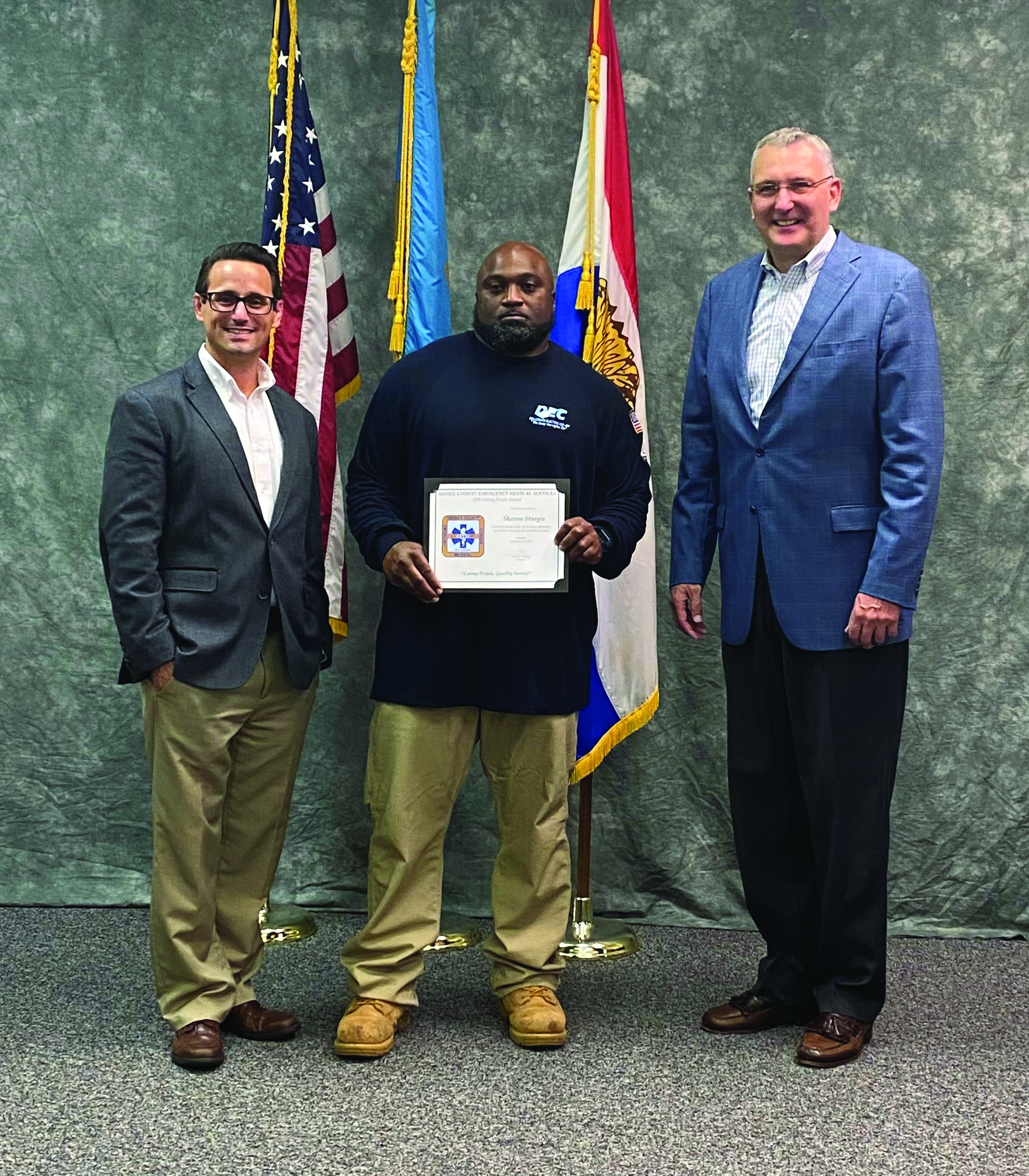 The Sussex County EMS and Volunteer Ambulance Association honors DEC Lineman Sheron Sturgis.