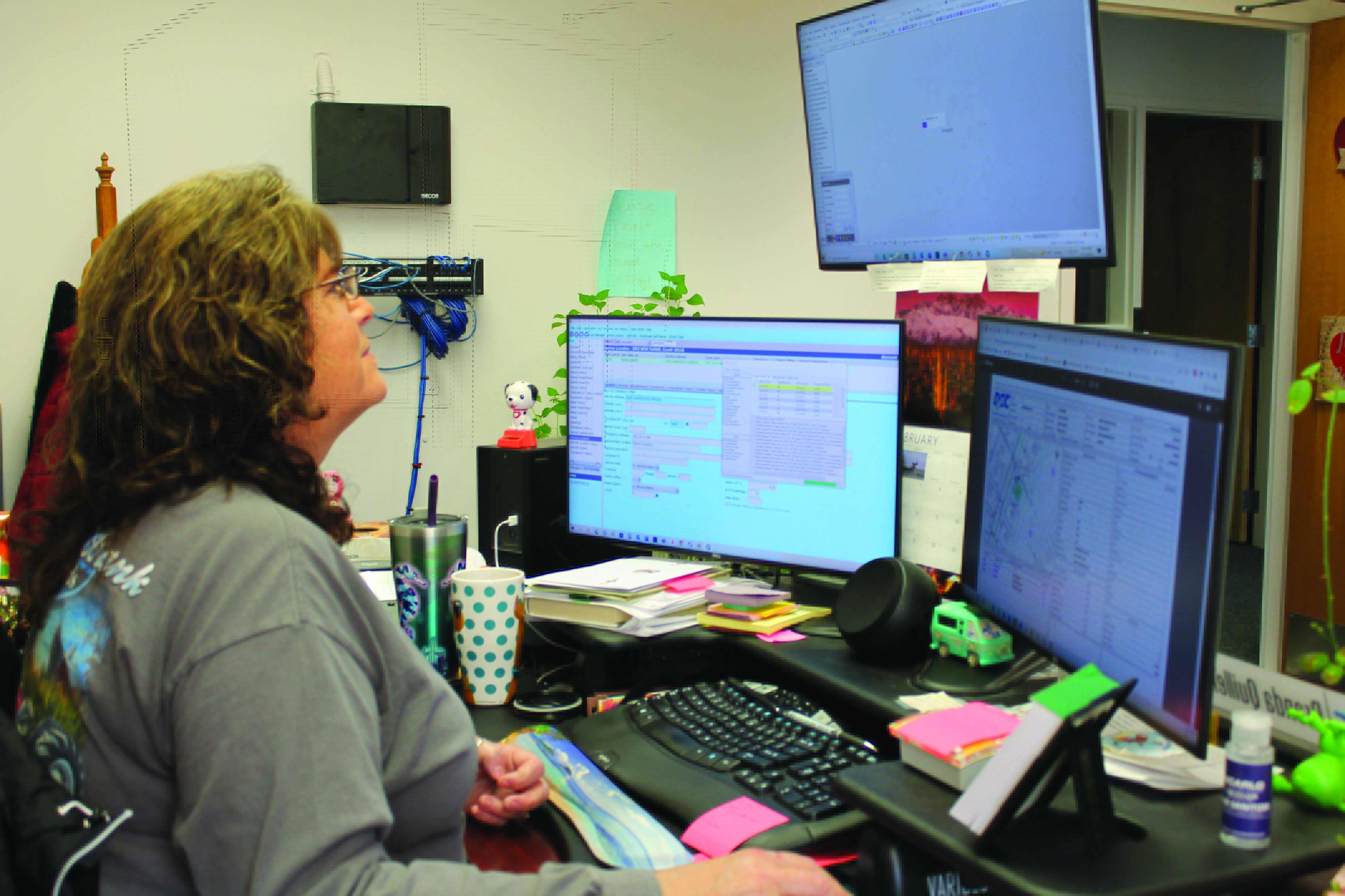 GIS Technician Brenda Quillen views completed jobs on the map.