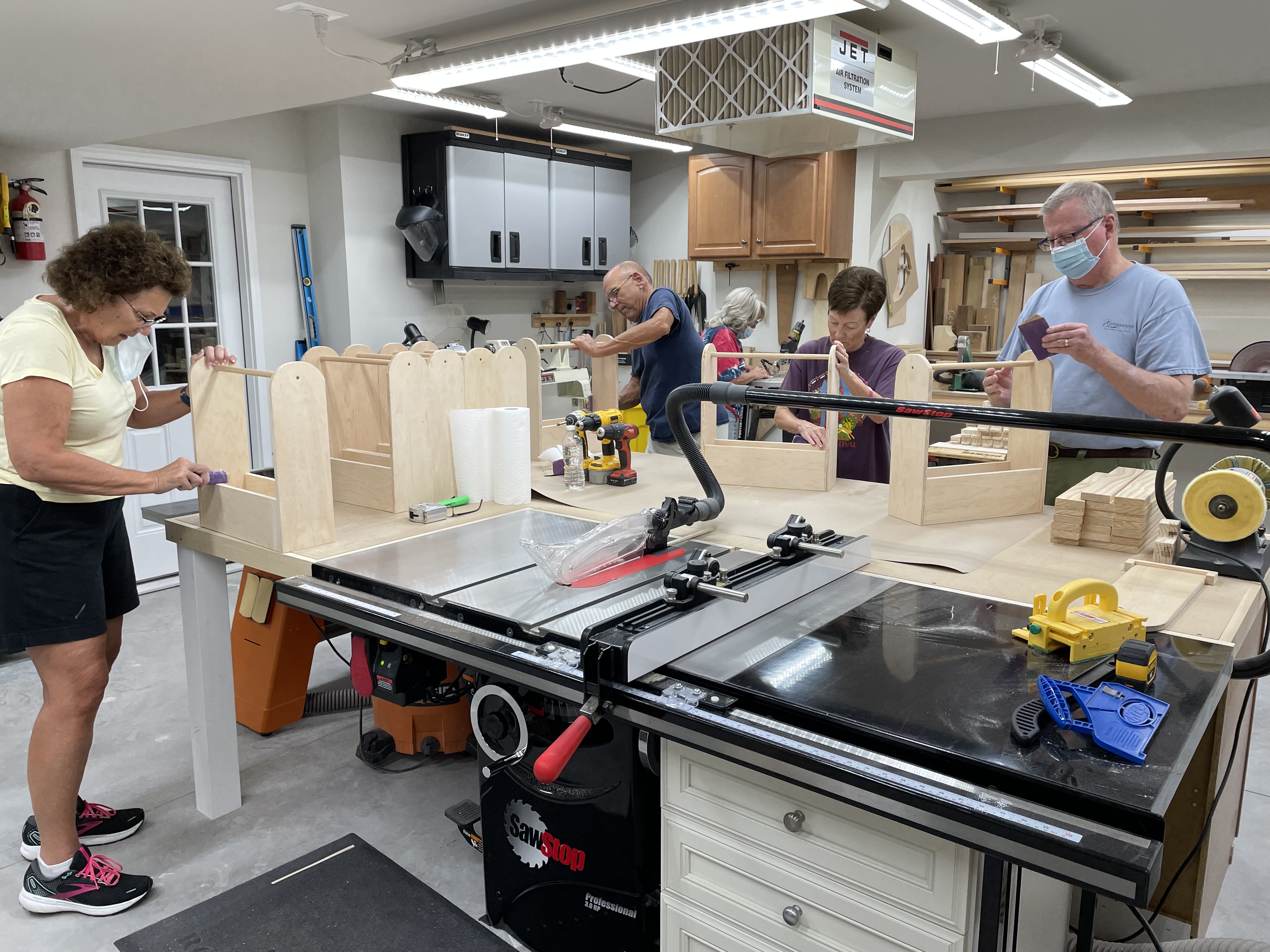 Marmen's neighbors brought an array of talents to the table in order to help make toys for the Sussex County chapter of Toys for Tots.