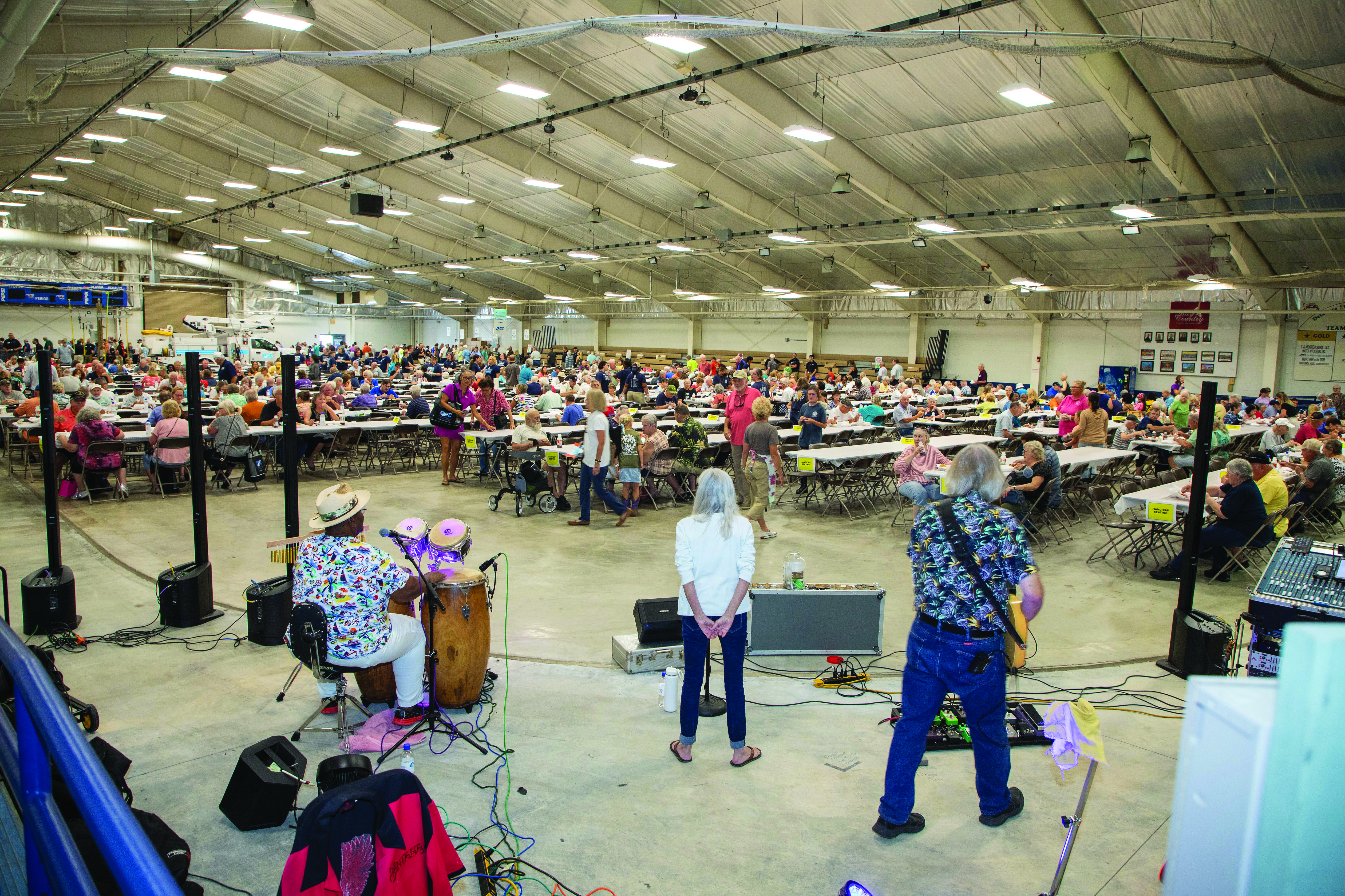 The evening kicked off with the Co-op's chicken dinner and community fair, with music provided by Junior Wilson.