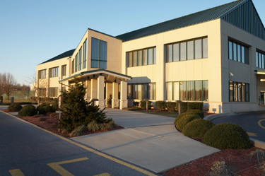 DEC builds a new headquarters building in 1998 as it reaches 50,000 members served.