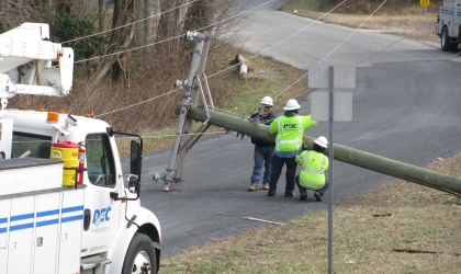 Linemen with broken pole