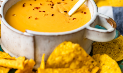 Nacho cheese sauce and chips