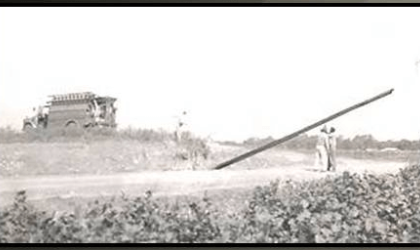 Men putting up electric pole