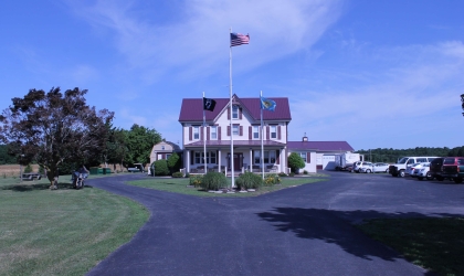 House with blacktop driveway