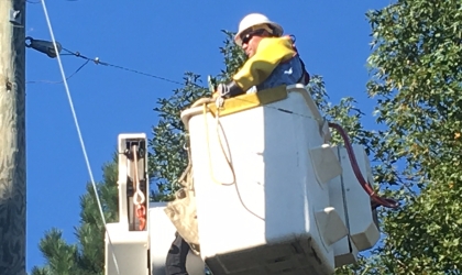 Lineman in Bucket in Air