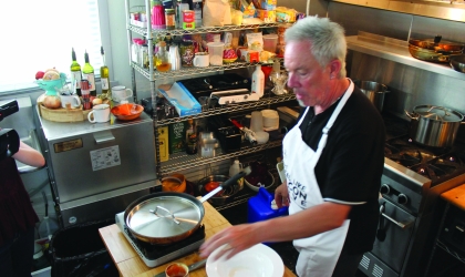 Man in kitchen