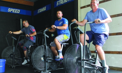 Men on exercise bikes