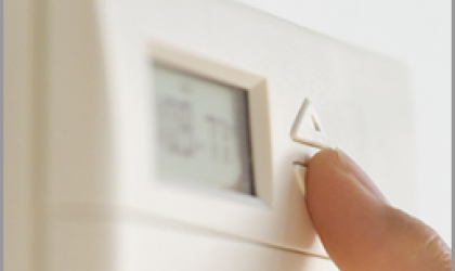 Finger on Thermostat
