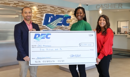 DEC’s COO Dwayne Street,  Junior Accounting and Capital Credits Clerk Amber Cannon and Manager of Billing and Capital Credits Ivanessa Cay announce the return of more than $5 million to members.