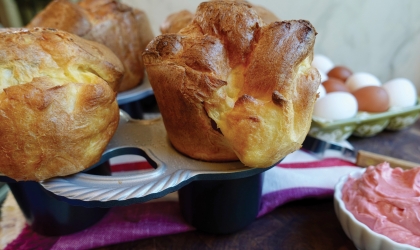 Popping out of the oven this holiday season are these tasty popovers with cranberry butter!