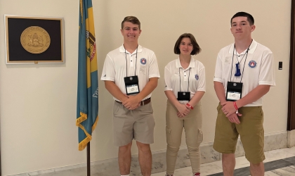 DEC's three student representatives from Youth Tour 2024 pose for a photo during a tour of Washington, D.C.