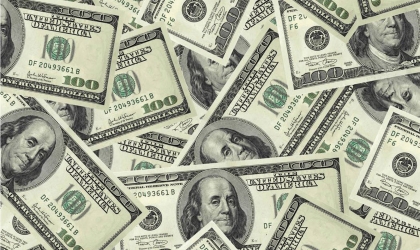 Photo of money, representing what you could save by following spring energy-saving tips.