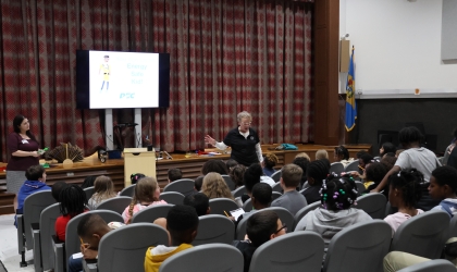 DEC’s Lauren Irby (L) and NEF’s Edna Hutchins (R) present the “Energy Safe Kids” program to Fourth Graders at Central Elementary School in Seaford.