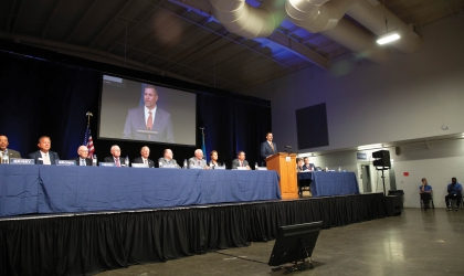 DEC's Board of Directors on stage at the Co-op's annual business meeting.
