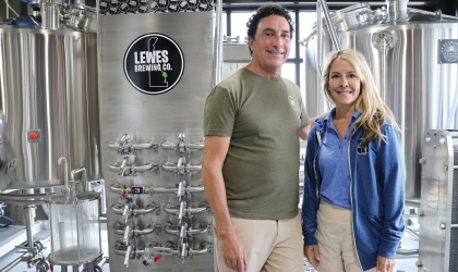 Dave and Christine Jones, owners of Lewes brewing Company, pose for a photo in the brewery.
