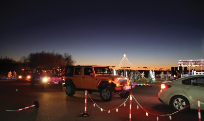 Visitors enjoy the light display from the comfort of their cars at the Drive-Thru Christmas on Merry Lane.