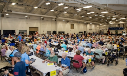 Members enjoy a fried chicken dinner at DEC's 2025 Annual Meeting.