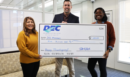 DEC’s Ivanessa Cay, Manager of Member Services, Rob Book, President &amp; CEO and Amber Cannon, Junior Accounting Clerk for Capital Credits and Payroll announce the return of $5 million to members.