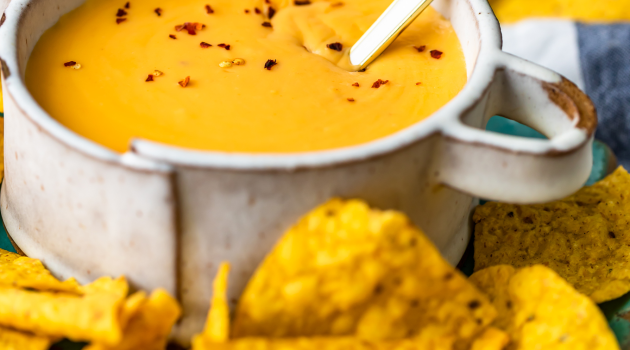 Nacho cheese sauce and chips