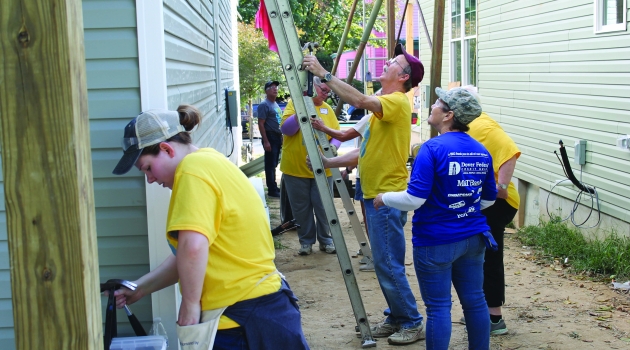 People working on house