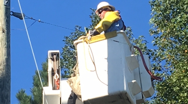 Lineman in Bucket in Air