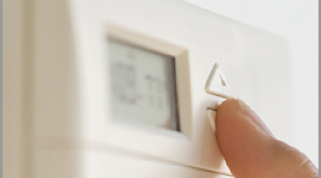 Finger on Thermostat
