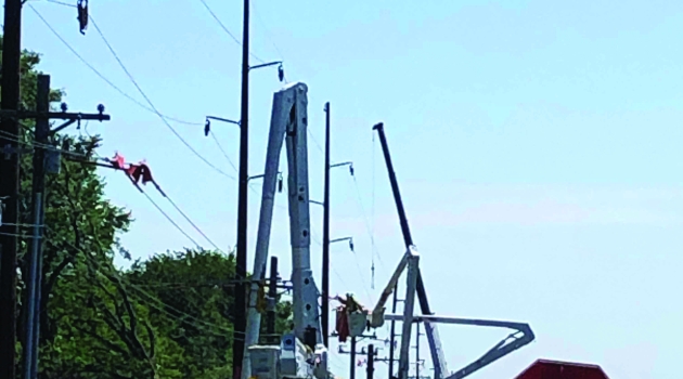 Linemen Working on Transmission Project