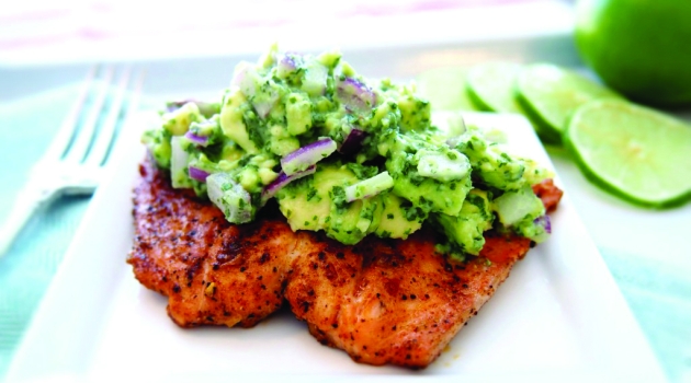 Salmon topped with avocado