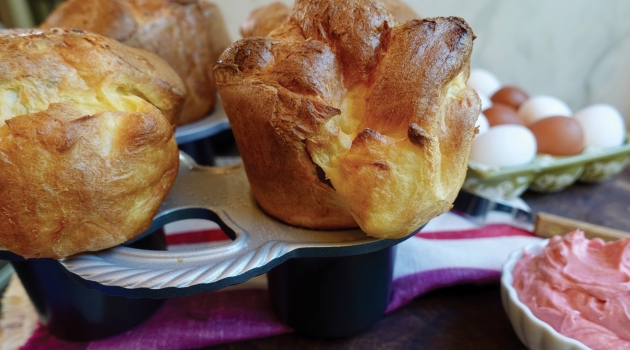 Popping out of the oven this holiday season are these tasty popovers with cranberry butter!