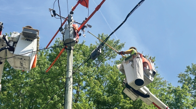 DEC lineworker Megan Simmons will demonstrate her skills as a lineworker and promote utility careers to young women at Girl Power Camp on Oct. 3.
