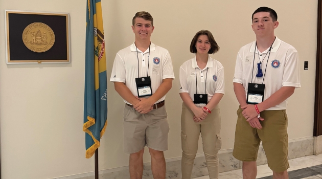 DEC's three student representatives from Youth Tour 2024 pose for a photo during a tour of Washington, D.C.
