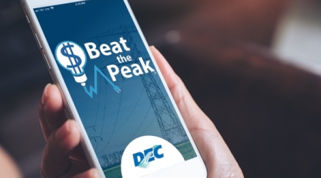 A cell phone with the Beat the Peak app