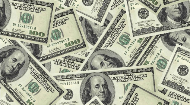 Photo of money, representing what you could save by following spring energy-saving tips.