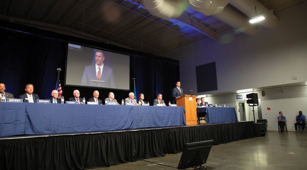 DEC's Board of Directors on stage at the Co-op's annual business meeting.