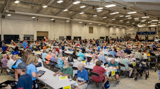 Members enjoy a fried chicken dinner at DEC's 2025 Annual Meeting.