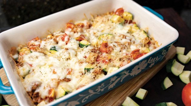 A pan of the Zucchini Chicken Bake displayed on a table.