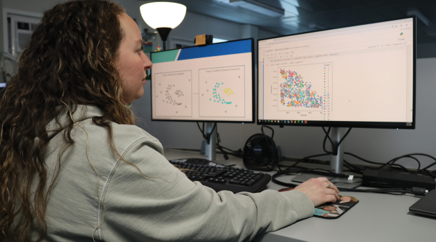 A DEC employee reviews data from an artificial intelligence (AI) model that can help the Co-op identify areas of our electric system where updates to equipment or maintenance could improve reliability.